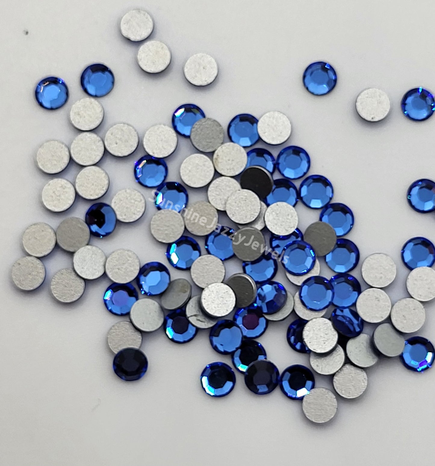 #2000 - Swarovski Crystal ss12 Round Flatback Rhinestones