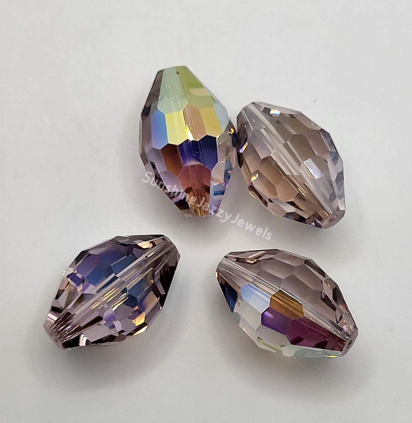 #5200 - Swarovski Crystal 18x12mm Oval Beads w/ AB Finish; 4pc per pack