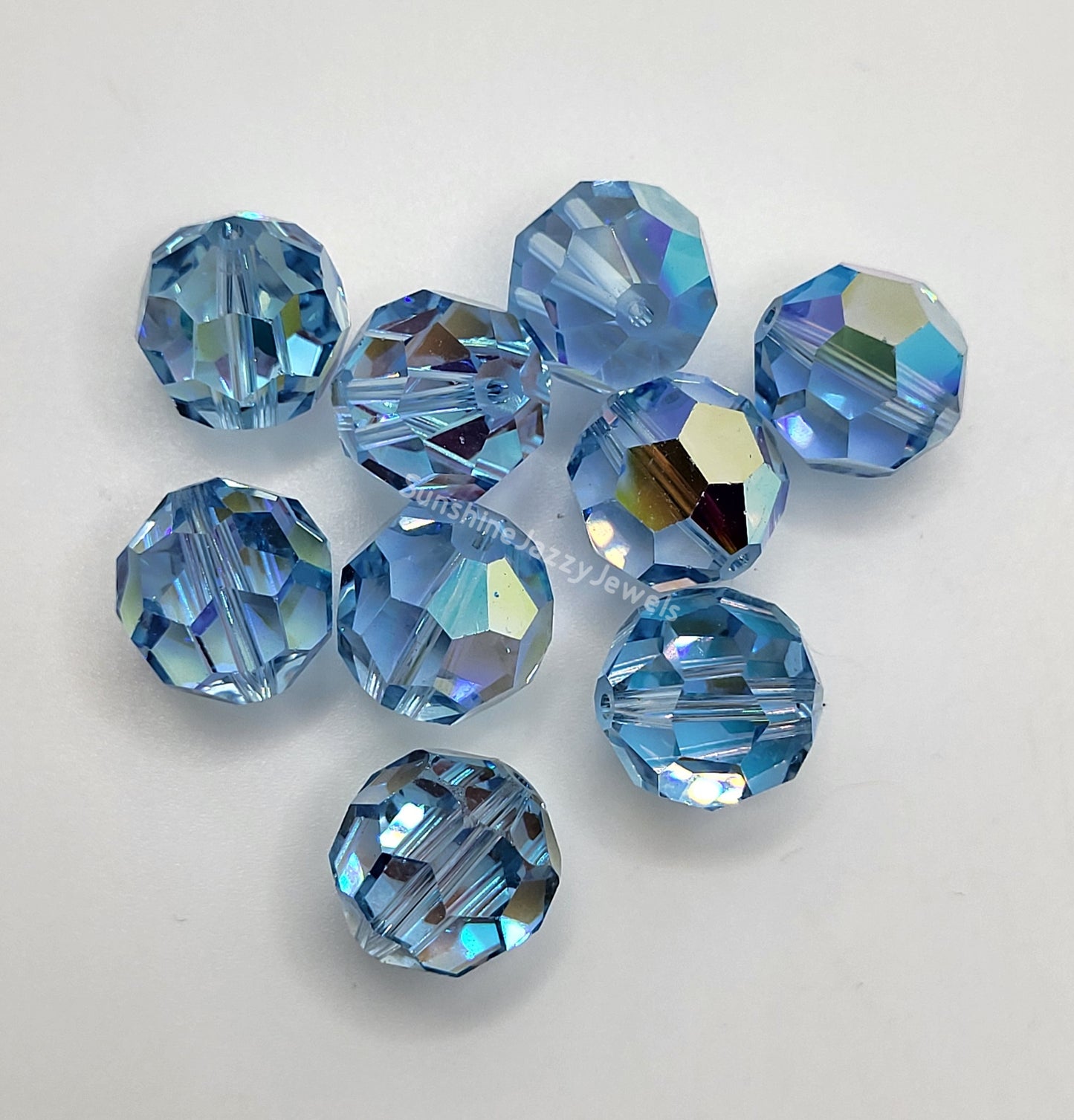 #5000 - Swarovski Crystal 12mm Faceted Round Beads; 4pc
