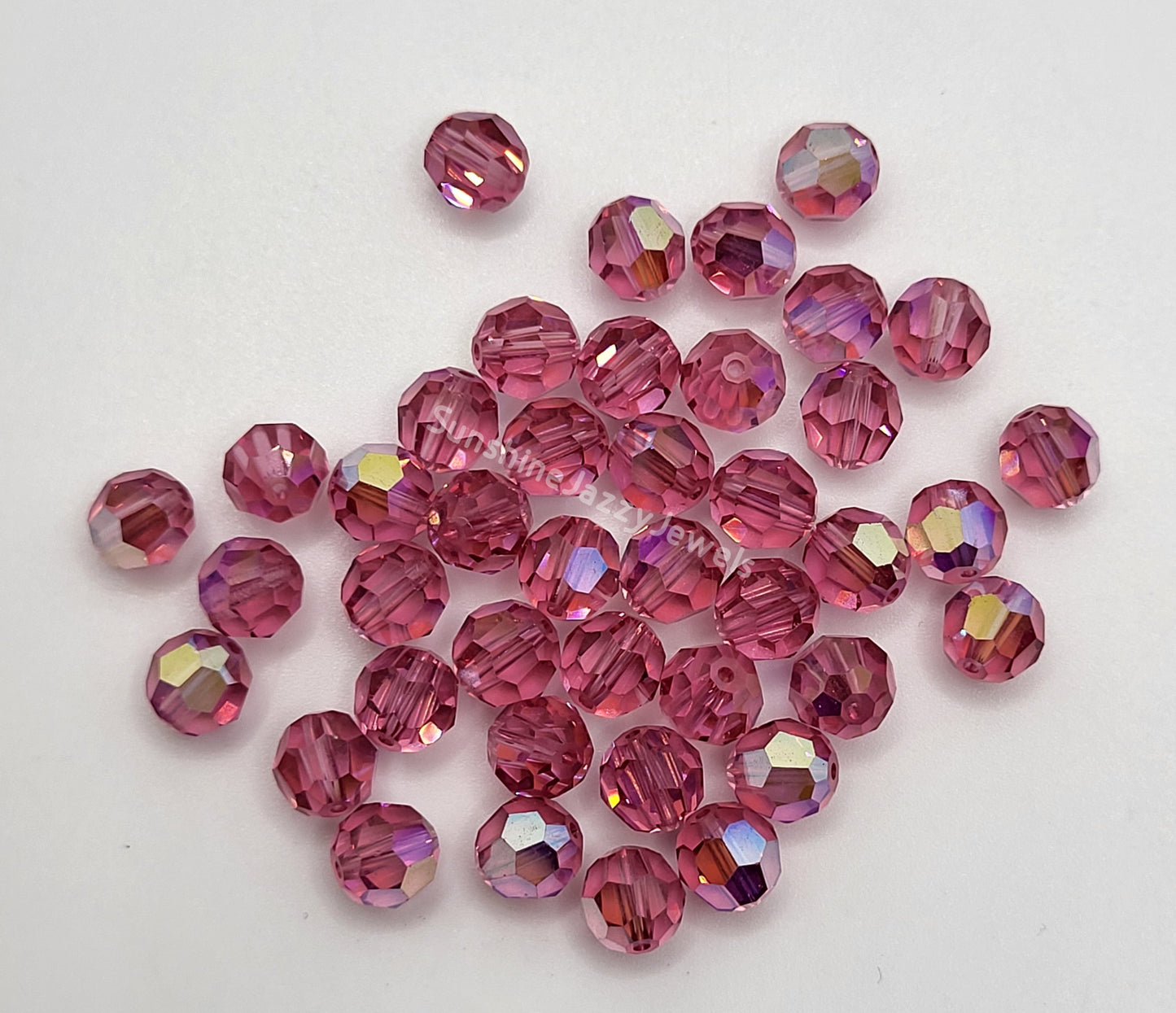 #5000 - Swarovski Crystal 6mm w/ AB Finish Faceted Round Beads; 12pc per pack