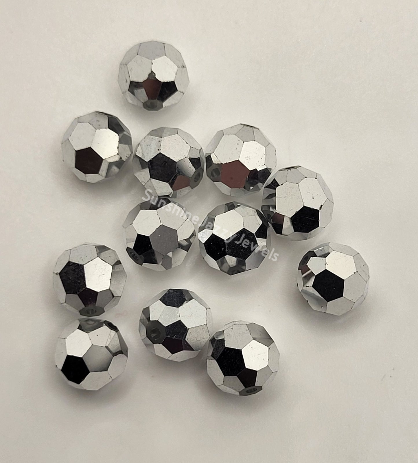 #5000 - Swarovski Crystal 7mm Round Beads; 12pc per pack