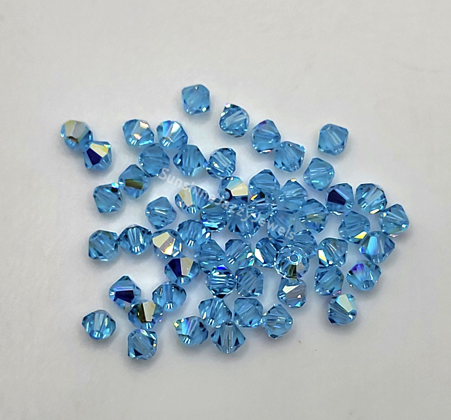 #5328 - Swarovski Crystal 6mm Bicone w/ AB Finish; 12pc per pack