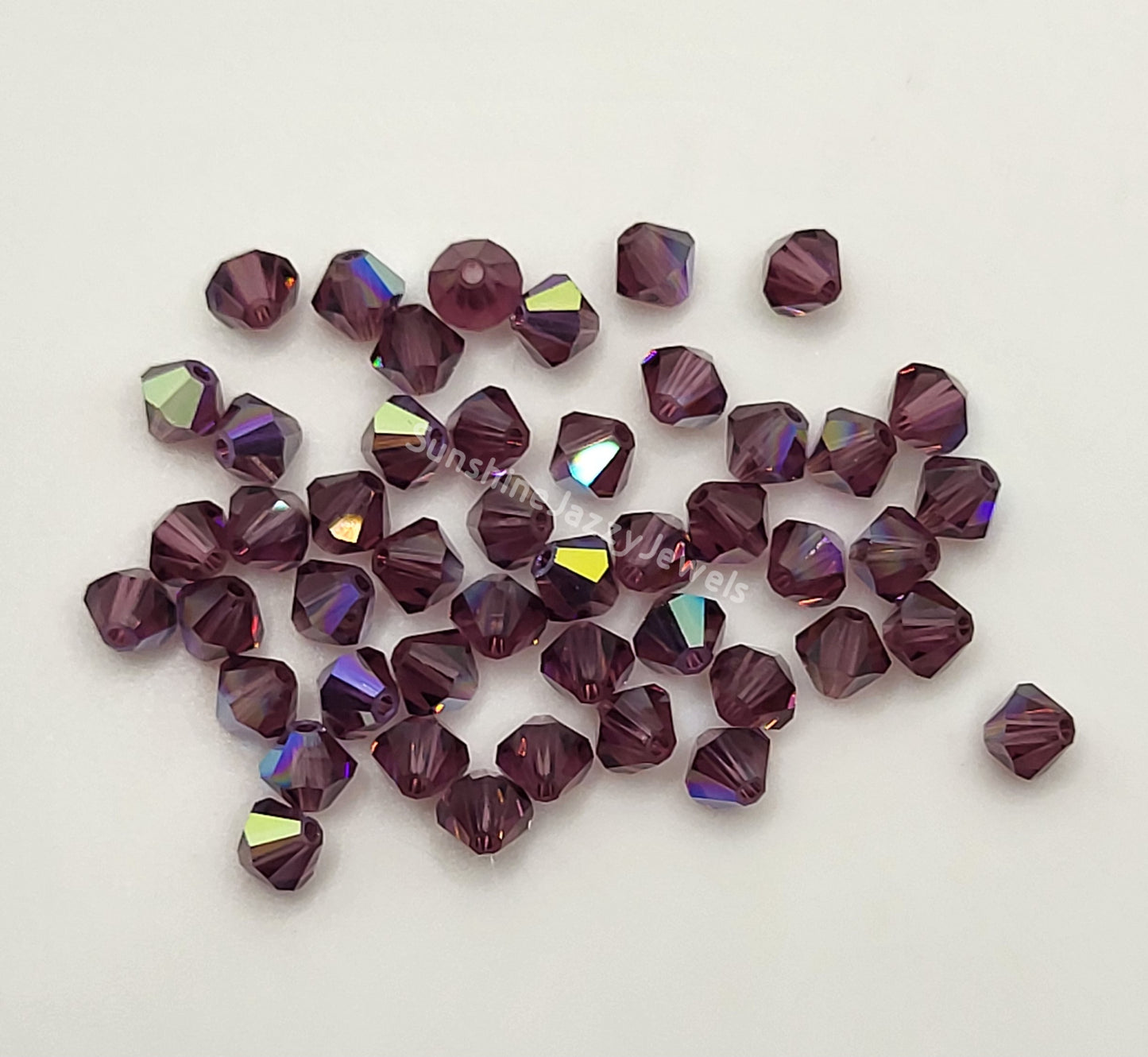 #5328 - Swarovski Crystal 6mm Bicone w/ AB Finish; 12pc per pack