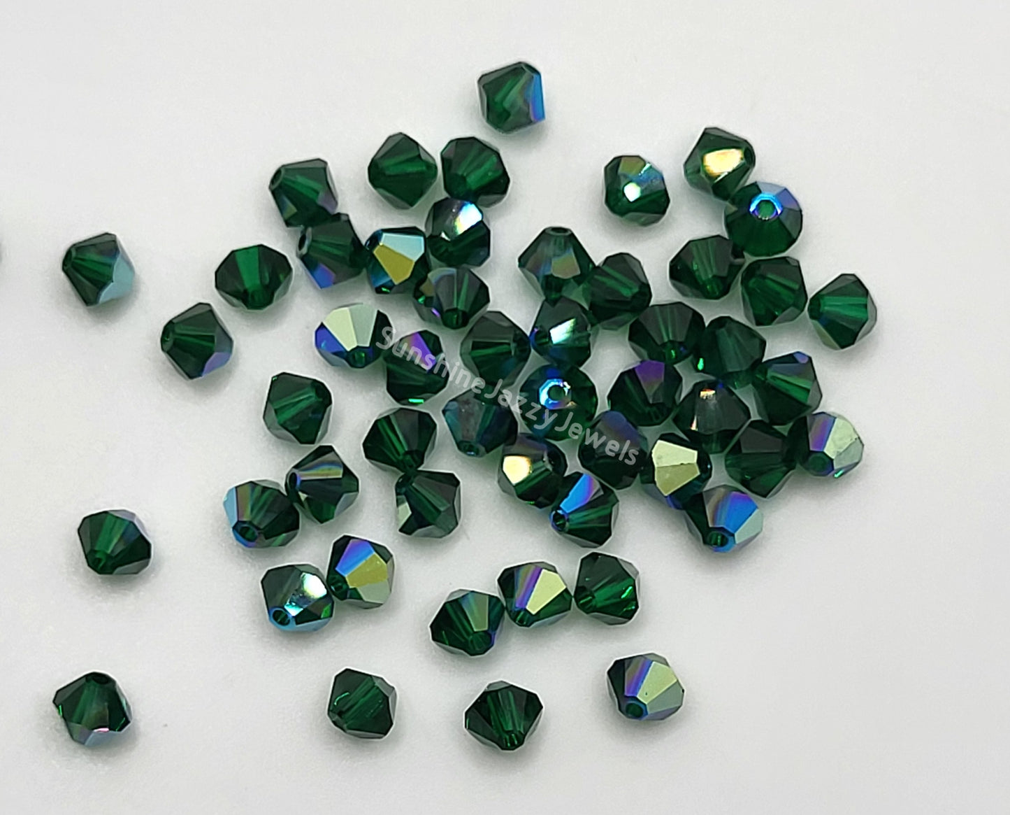 #5328 - Swarovski Crystal 3mm Bicone Beads w/ AB Finish; 24pc per pack