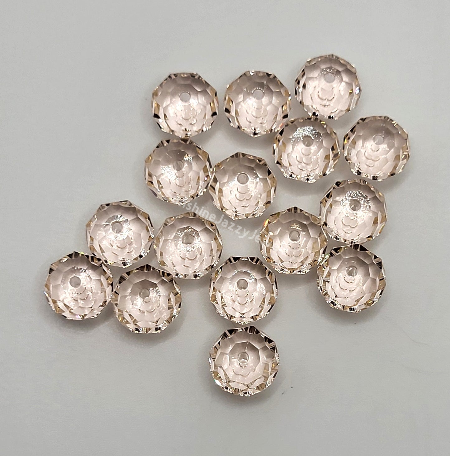 #5040 - Swarovski Crystal 8mm Briolette/ Donut Bead