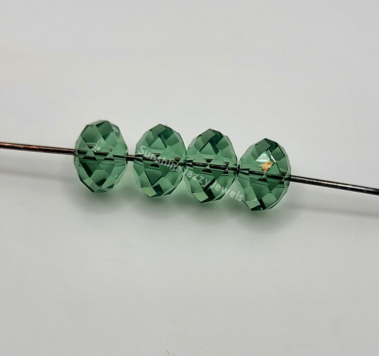 #5040 - Swarovski Crystal 8mm Briolette/ Donut Bead