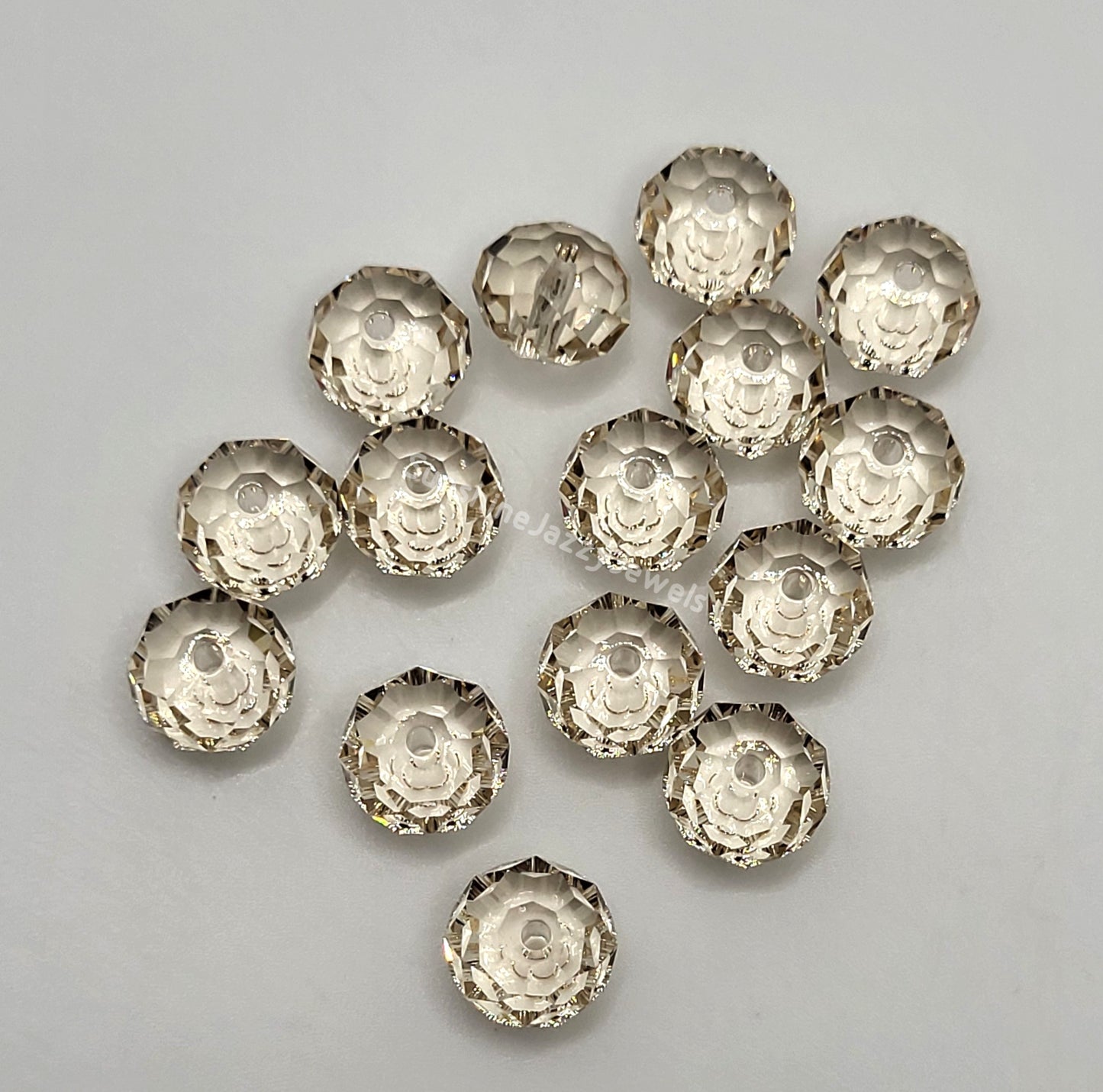 #5040 - Swarovski Crystal 8mm Briolette/ Donut Bead