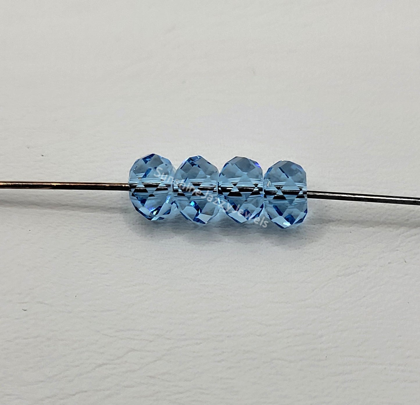 #5040 - Swarovski Crystal 6mm Briolette/ Donut/ Spacer Beads