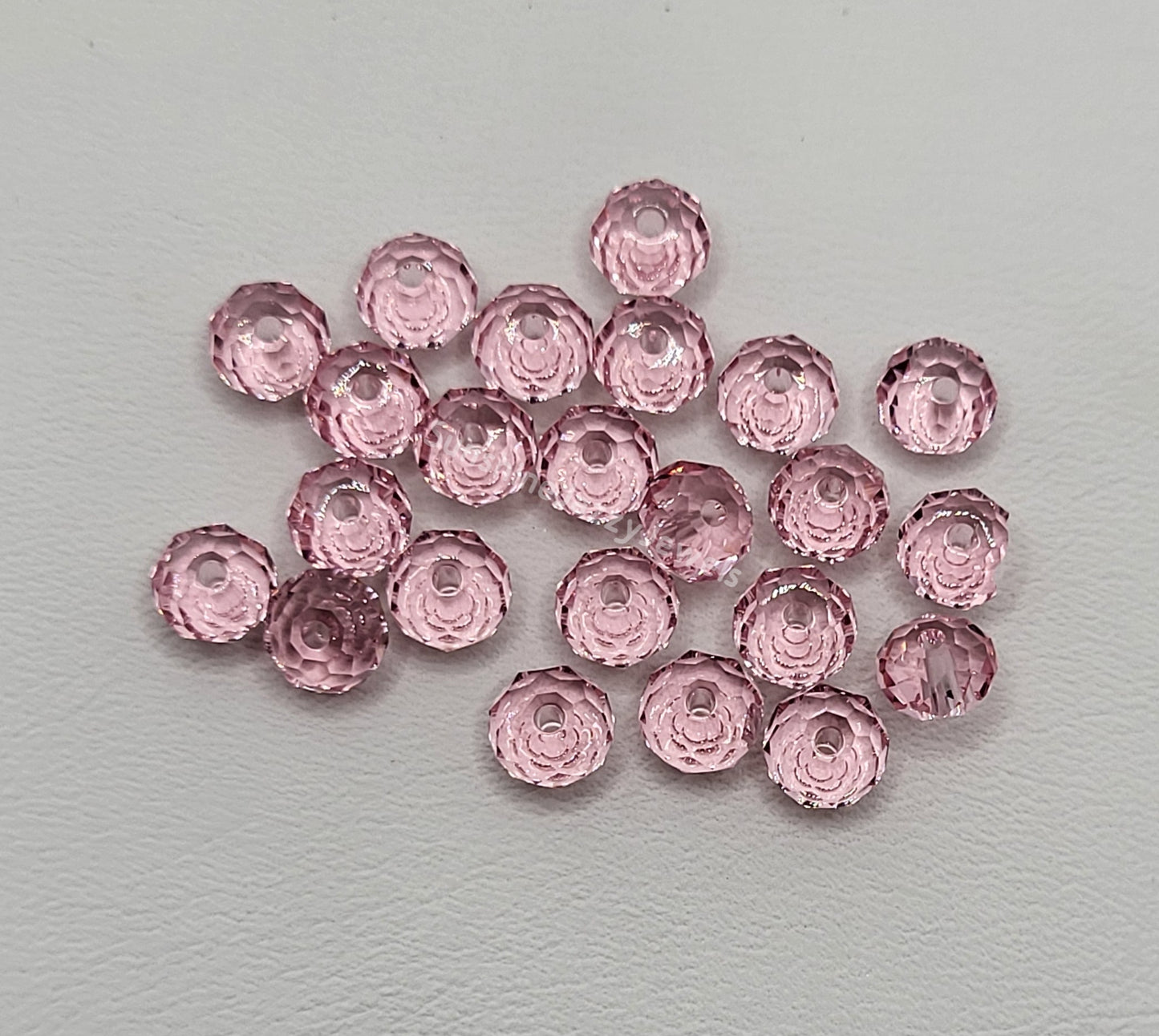#5040 - Swarovski Crystal 6mm Briolette/ Donut/ Spacer Beads