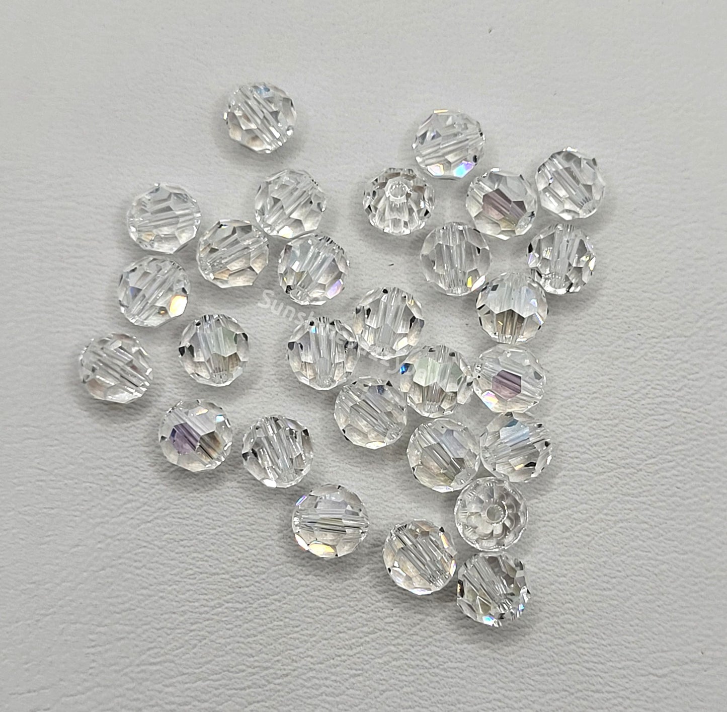 #5000 - Swarovski Crystal 4mm Faceted Round Beads w/ Crystal Effect
