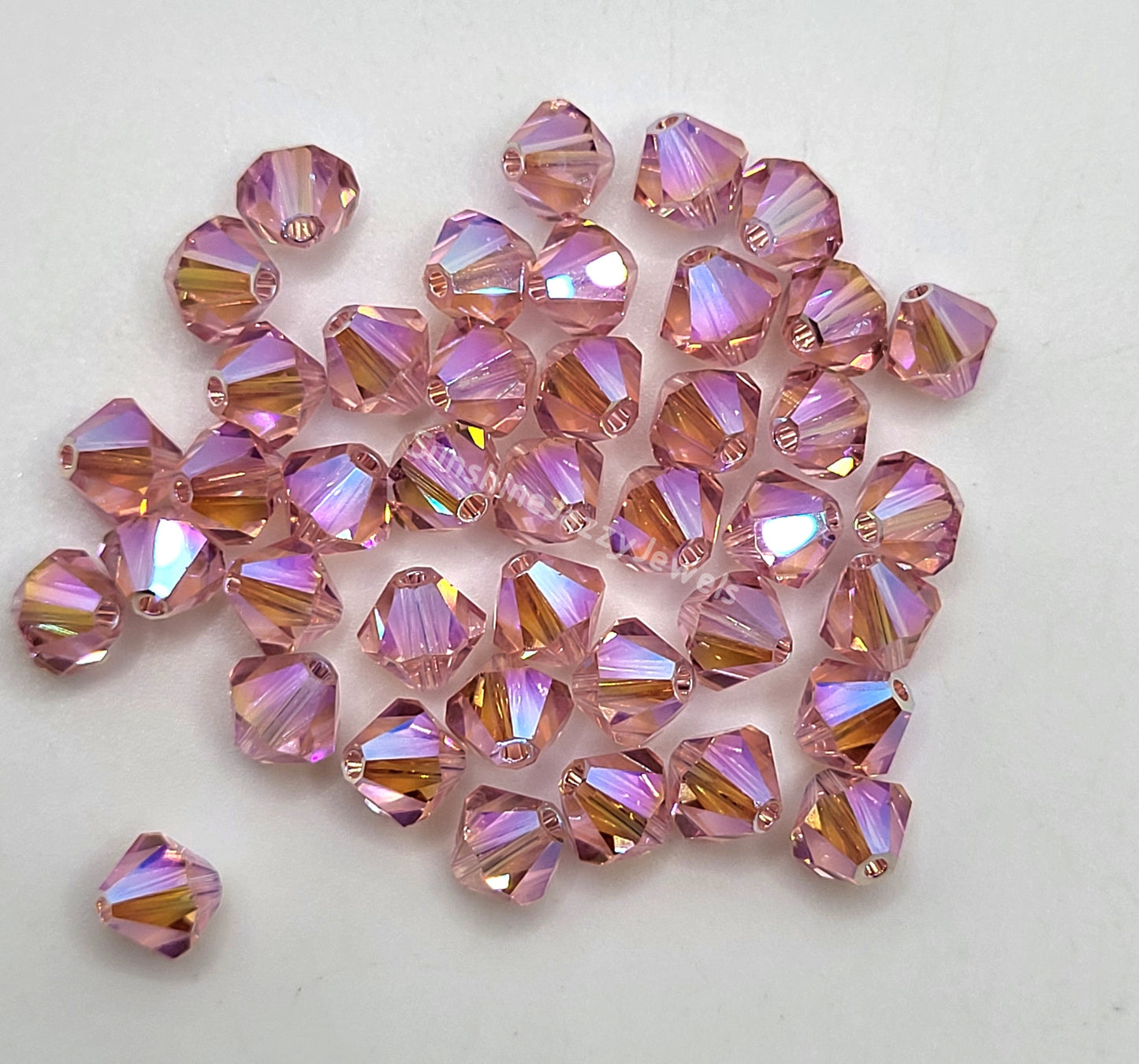 #5328 - Swarovski Crystal 6mm AB2X Bicone Beads; 12pc per pack
