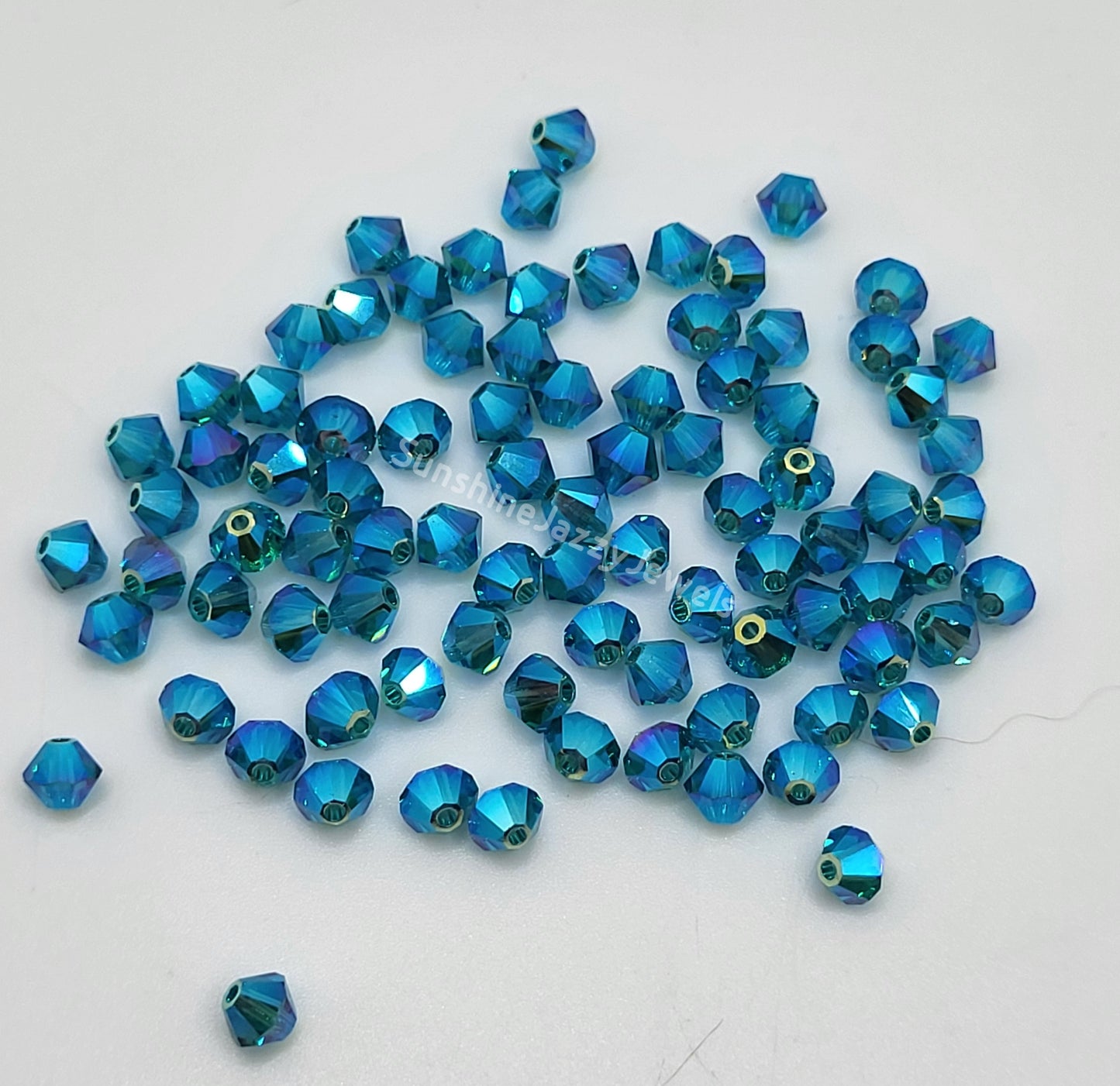 #5328 - Swarovski Crystal 4mm AB2X Bicone Beads; 24pc per pack