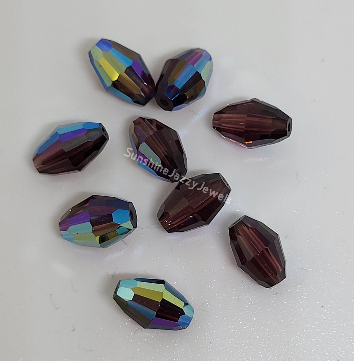 WEB EXCLUSIVE - #5200 - 12pc Swarovski Crystal Burgundy AB 9x6mm Oval Beads