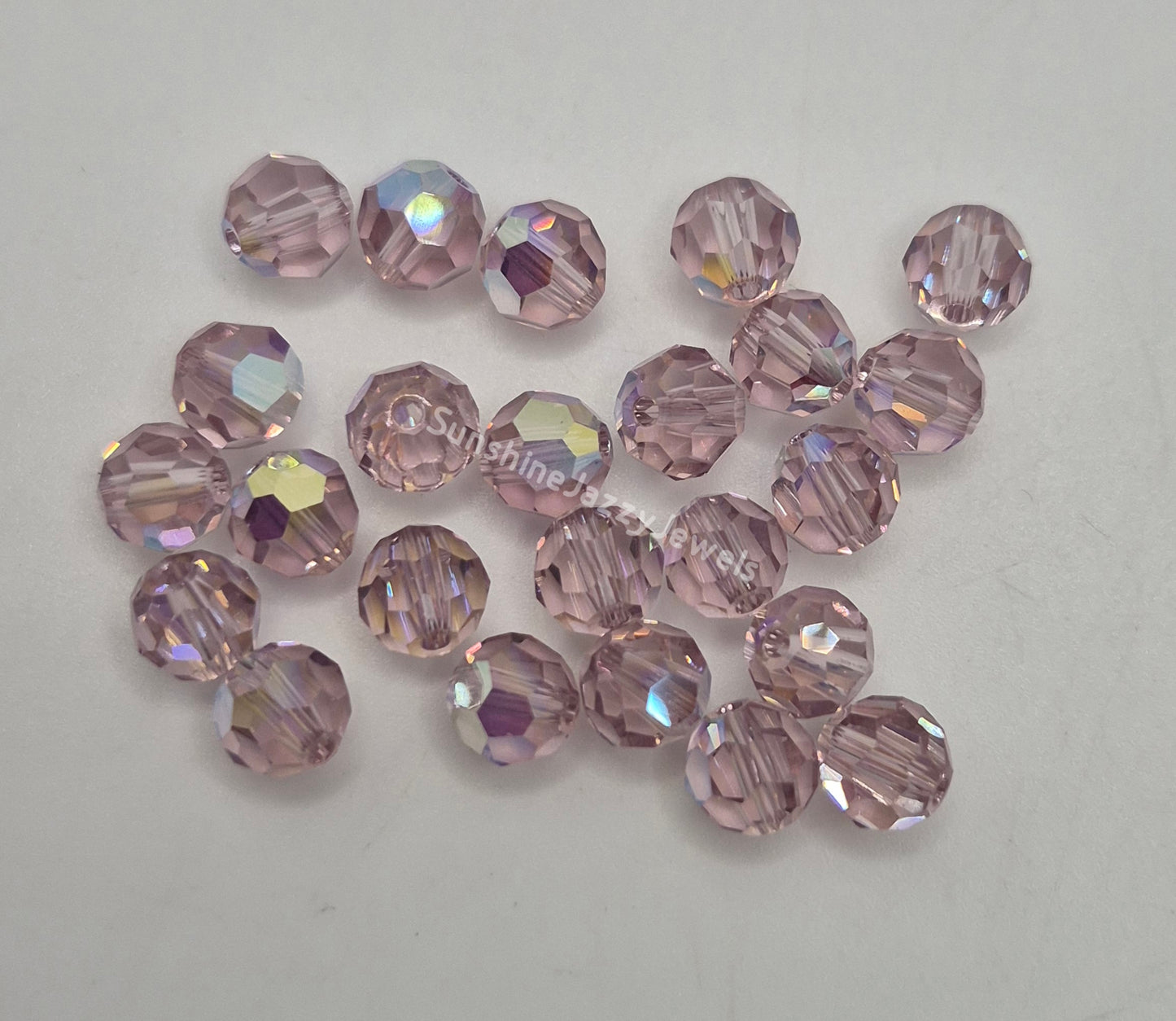 #5000 - Swarovski Crystal 6mm w/ AB Finish Faceted Round Beads; 12pc per pack