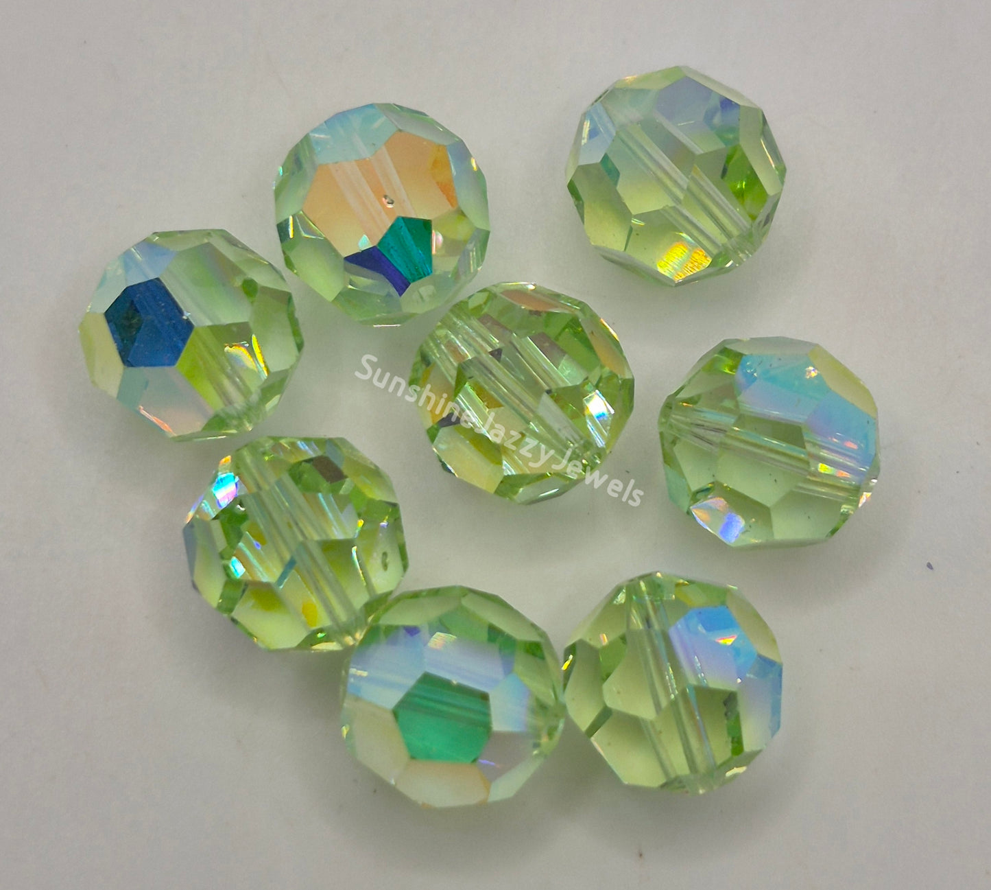 #5000 - 8pc Swarovski Crystal Chrysolite AB 12mm Round Beads; LAST ONE