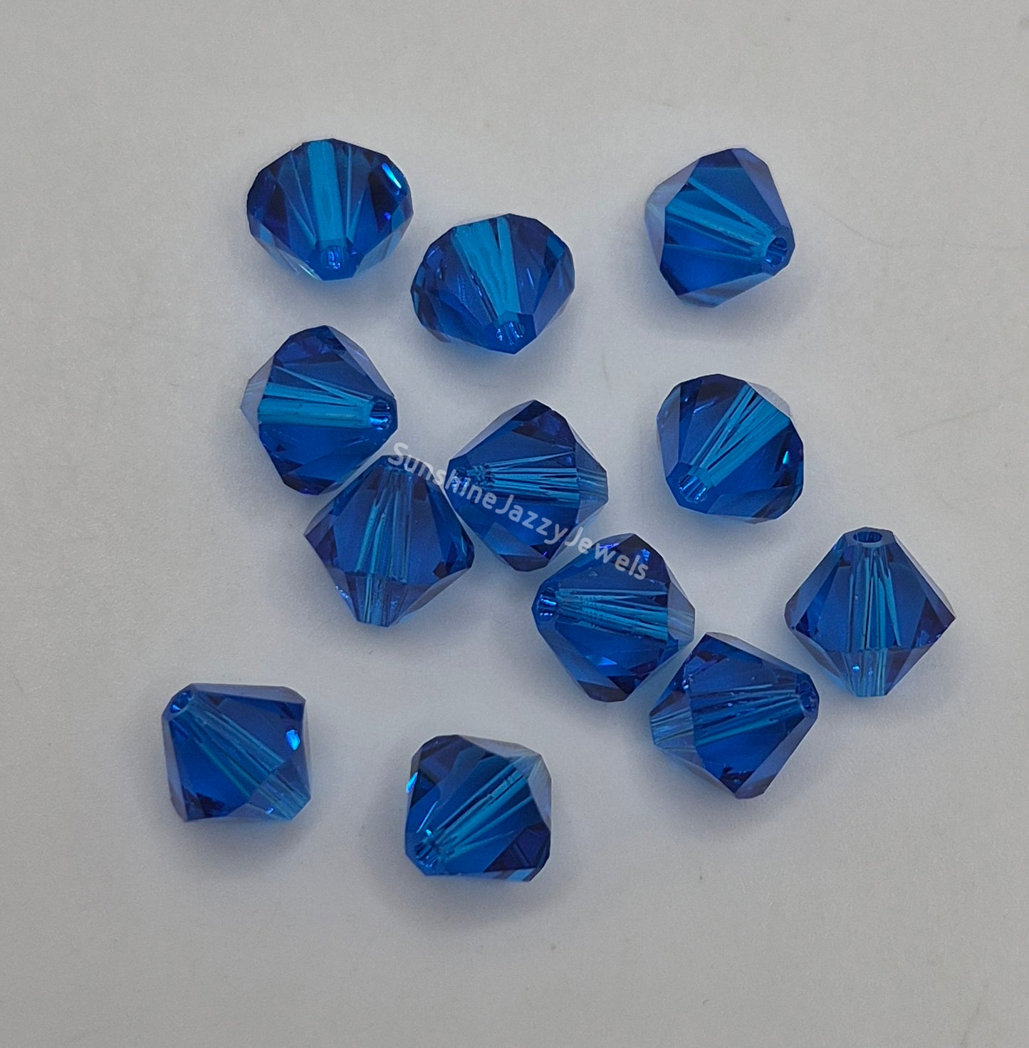 #5301 - 12pc Swarovski Crystal Capri Blue 8mm Bicone Beads; LAST ONE