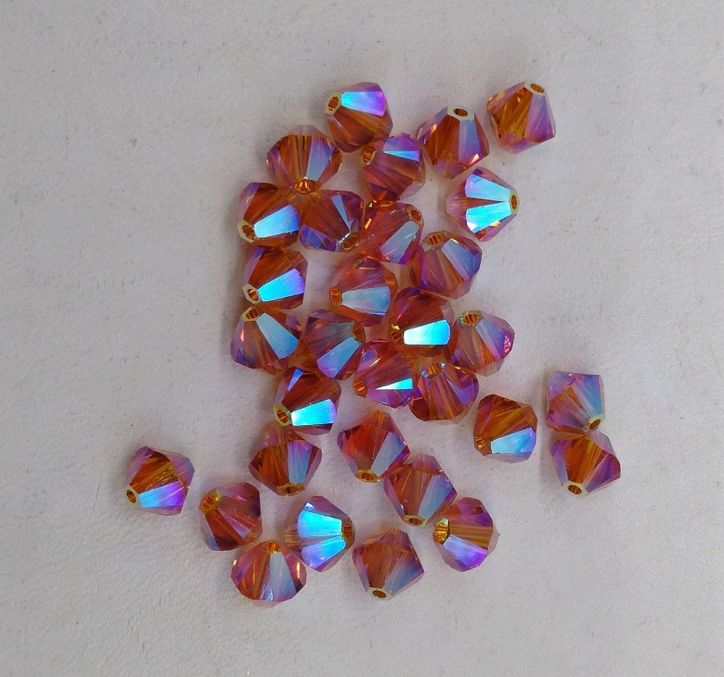 #5328 - Swarovski Crystal 6mm AB2X Bicone Beads; 12pc per pack