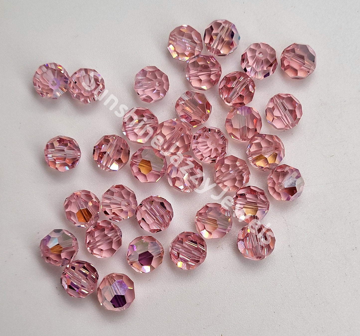 #5000 - Swarovski Crystal 7mm Round Beads; 12pc per pack