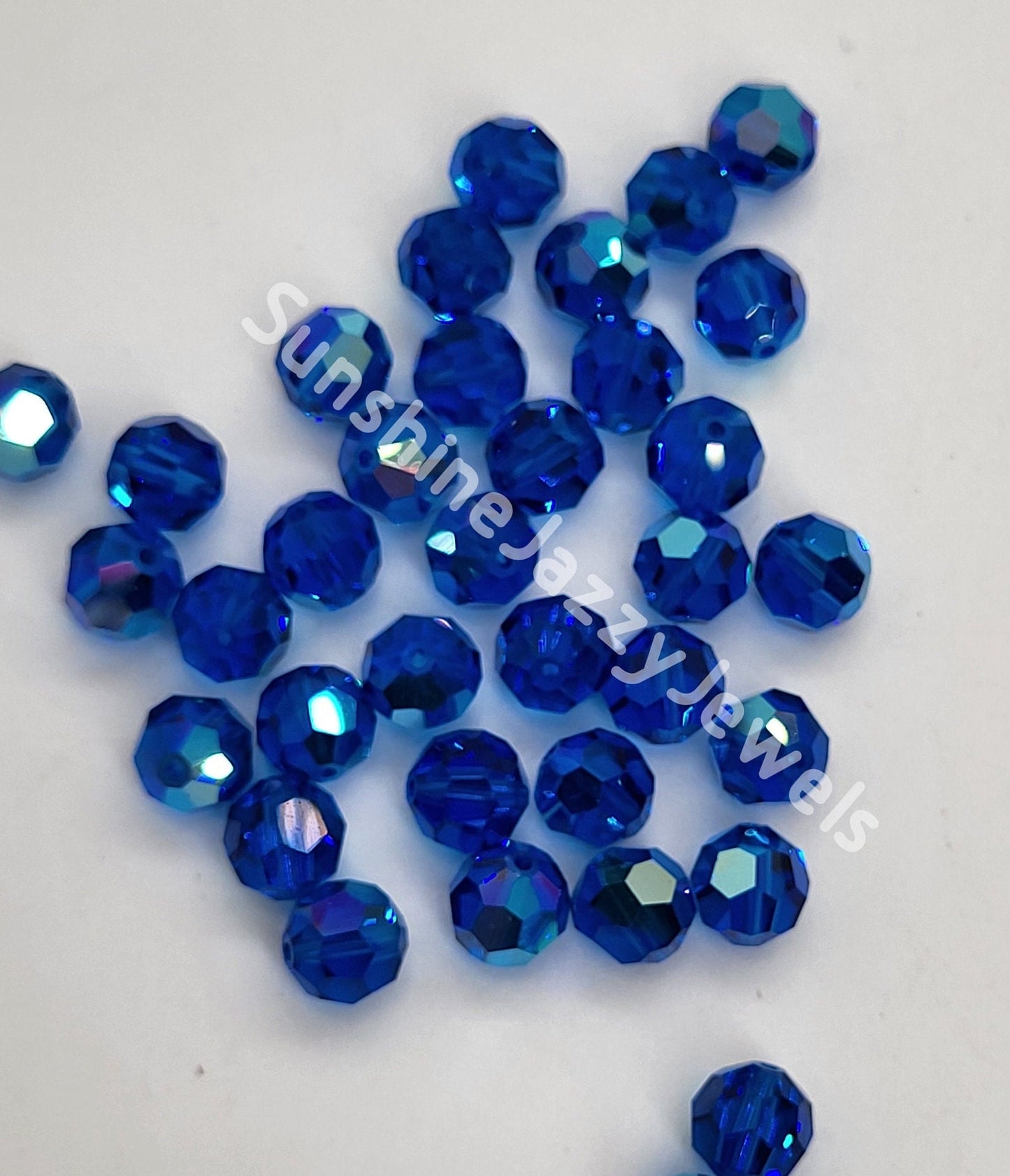 #5000 - Swarovski Crystal 7mm Round Beads; 12pc per pack