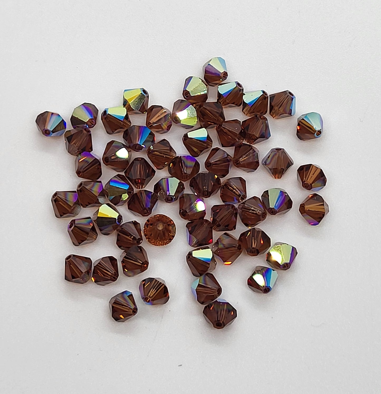 #5328 - Swarovski Crystal 4mm Bicone Beads w/ AB Finish