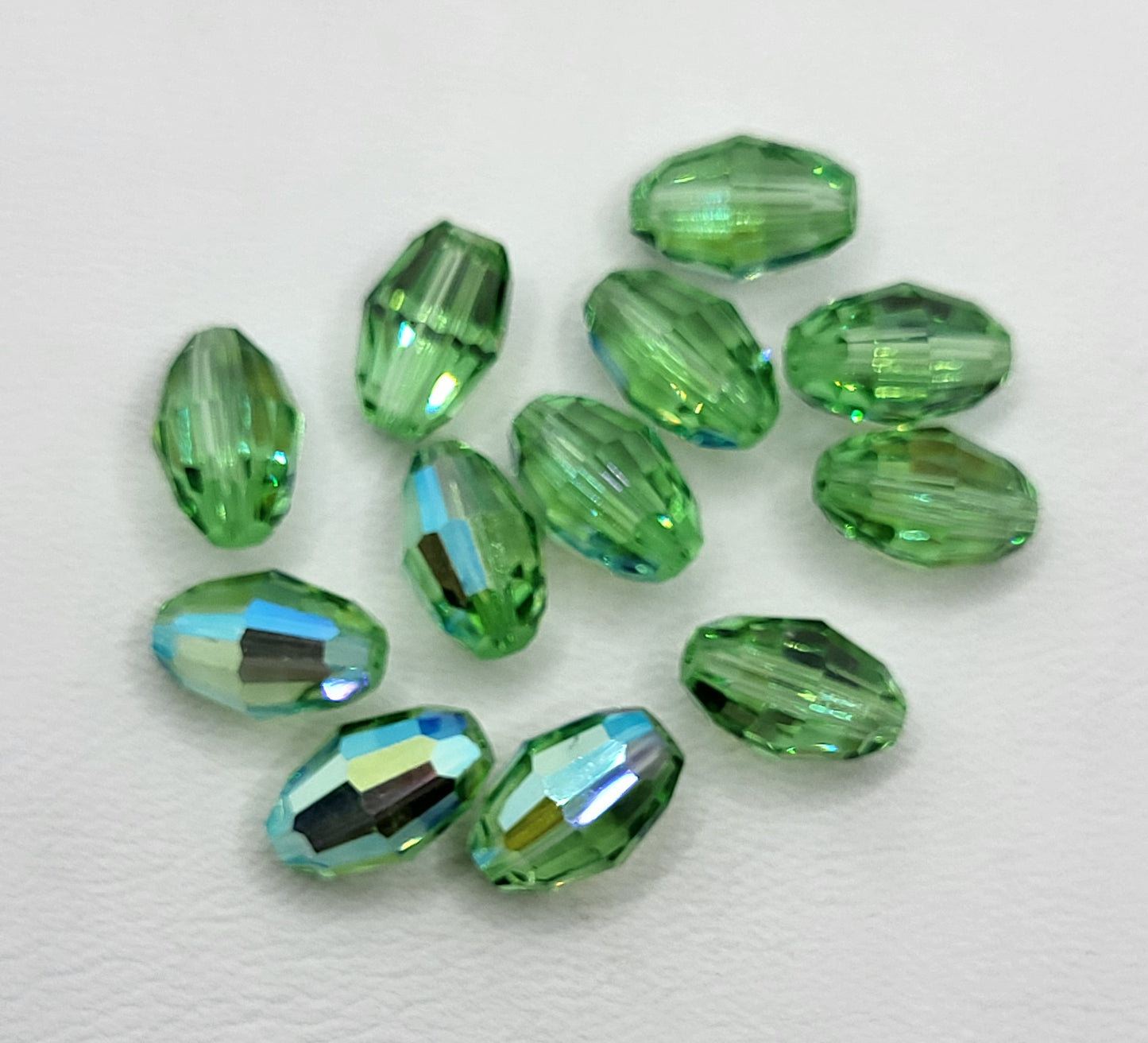 #5200 - 12pc Swarovski Crystal Peridot AB 9x6mm Oval Beads; LAST ONE