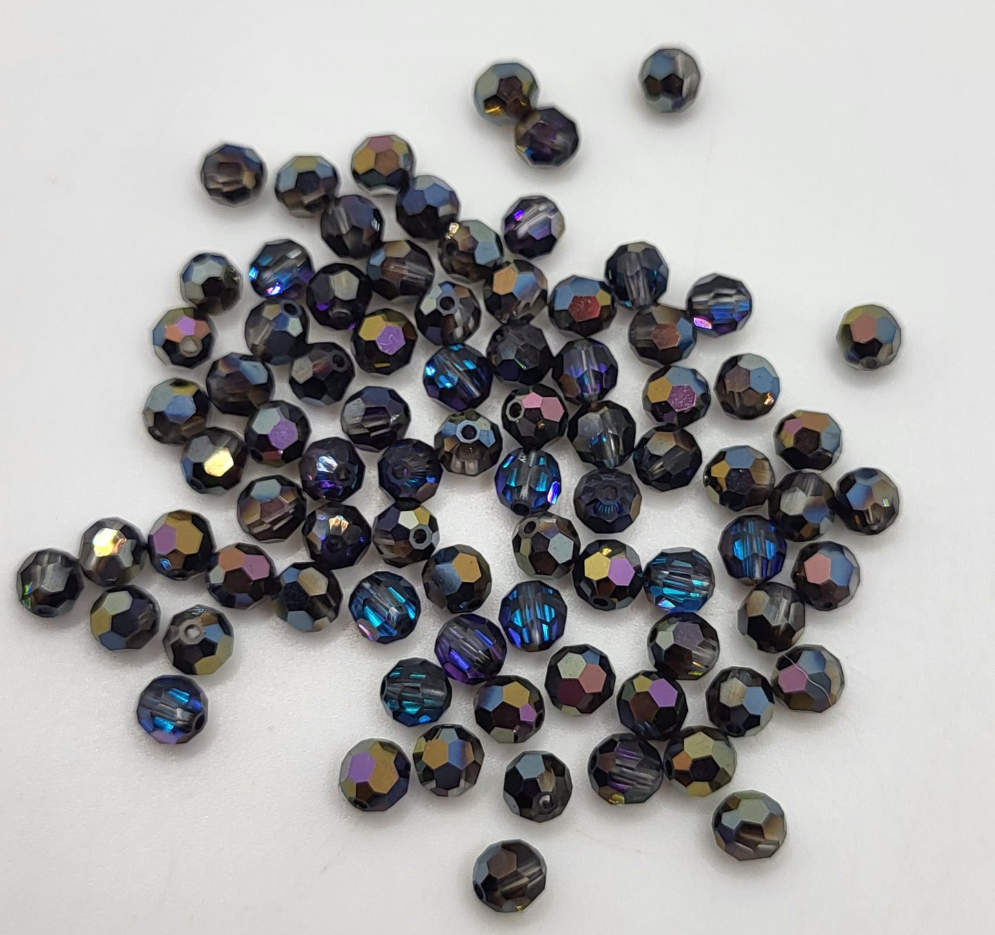 #5000 - Swarovski Crystal 4mm Faceted Round Beads w/ Crystal Effect; 24pc per pack