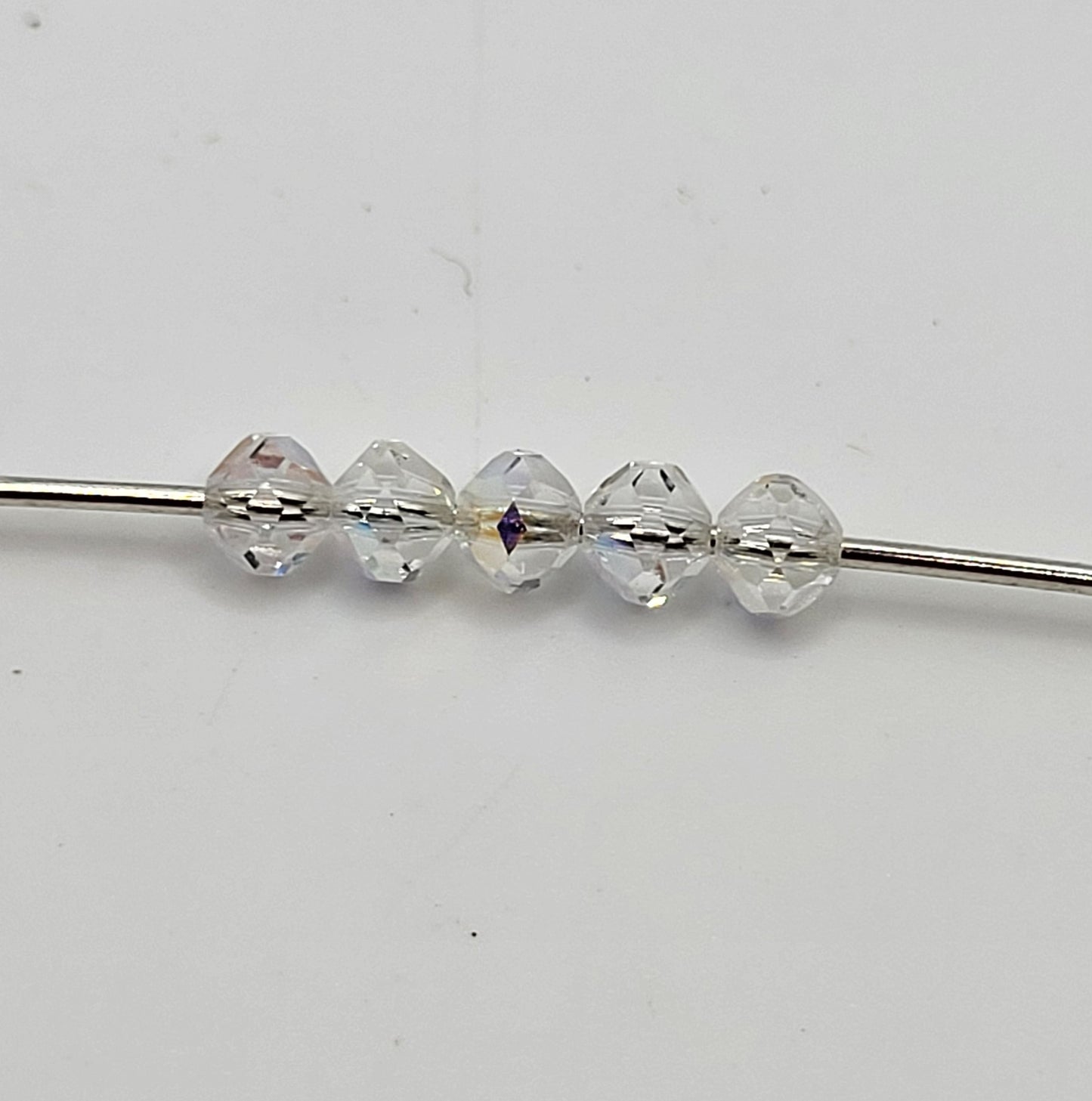 #5309/1 - Swarovski Crystal Clear AB 4mm Rounded Bicone Beads; 24pc per pack