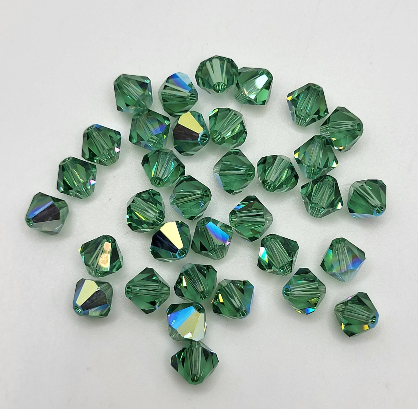 #5328 - Swarovski Crystal 6mm Bicone w/ AB Finish; 12pc per pack