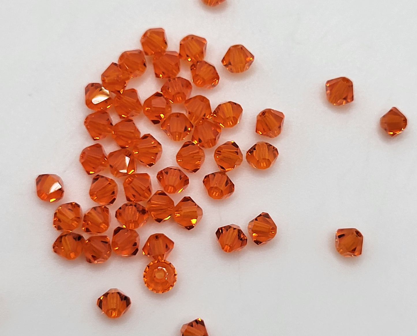 #5301 - 48pc Swarovski Crystal Red Topaz 3mm Bicone Beads; LAST ONE