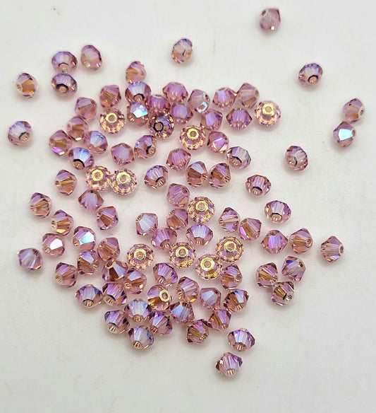 #5328 - Swarovski Crystal 3mm Bicones w/ AB2X Finish; 24pc per pack