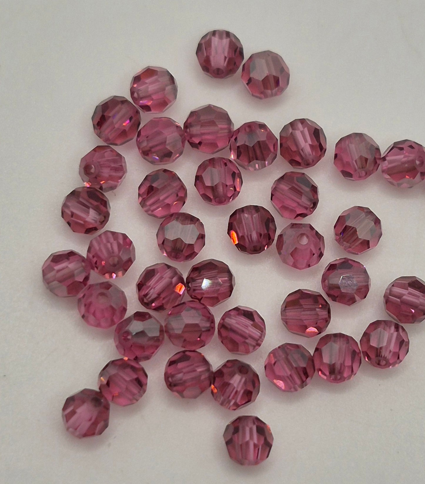 #5000 - Swarovski Crystal 4mm Faceted Round Beads w/ Satin Effect; 24pc per pack