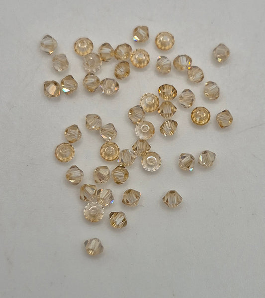 #5328 - 48pc Swarovski Crystal Golden Shadow 2.5mm Bicone Beads; LAST ONE