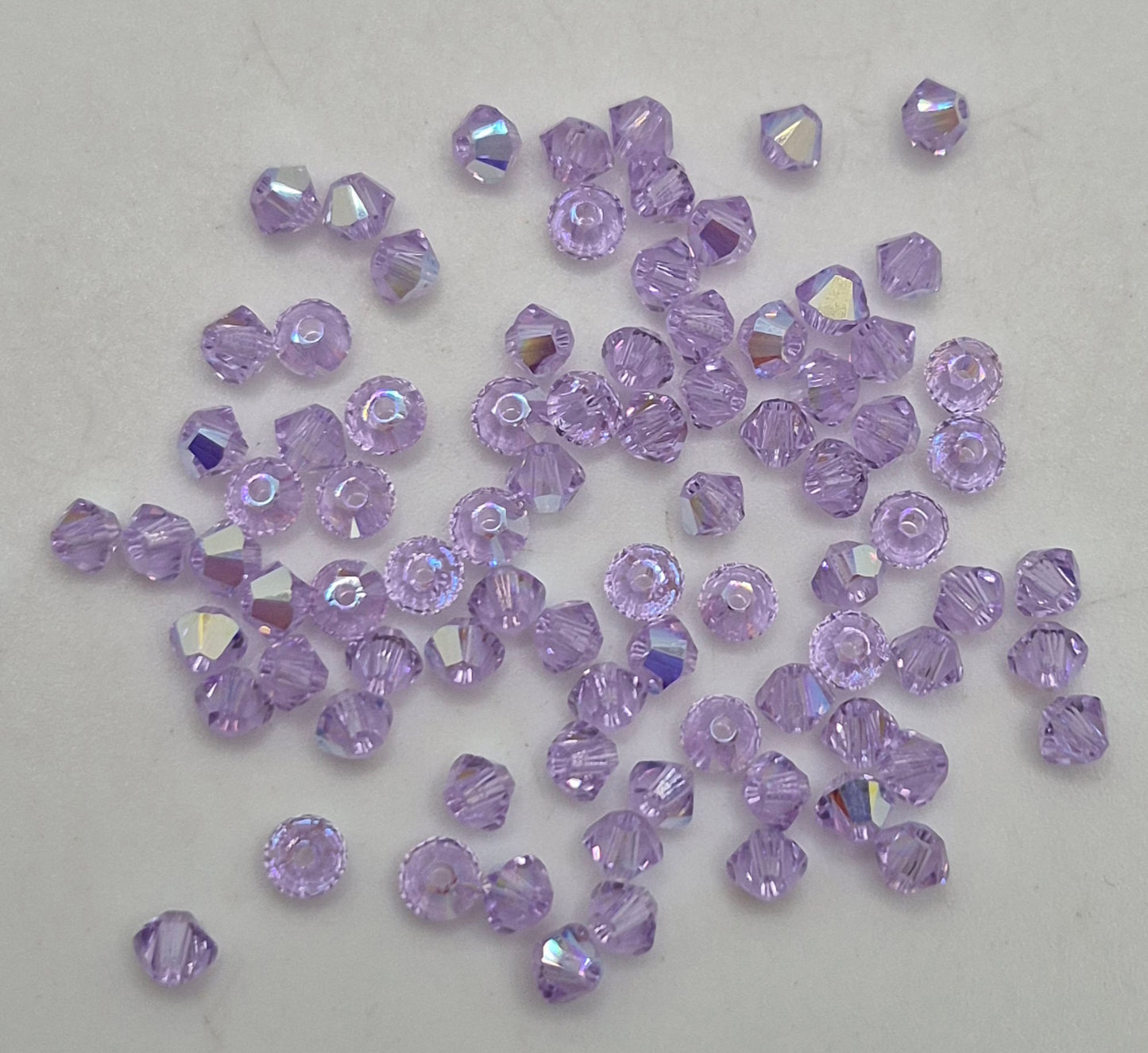 #5328 - Swarovski Crystal 3mm Bicone Beads w/ AB Finish; 24pc per pack