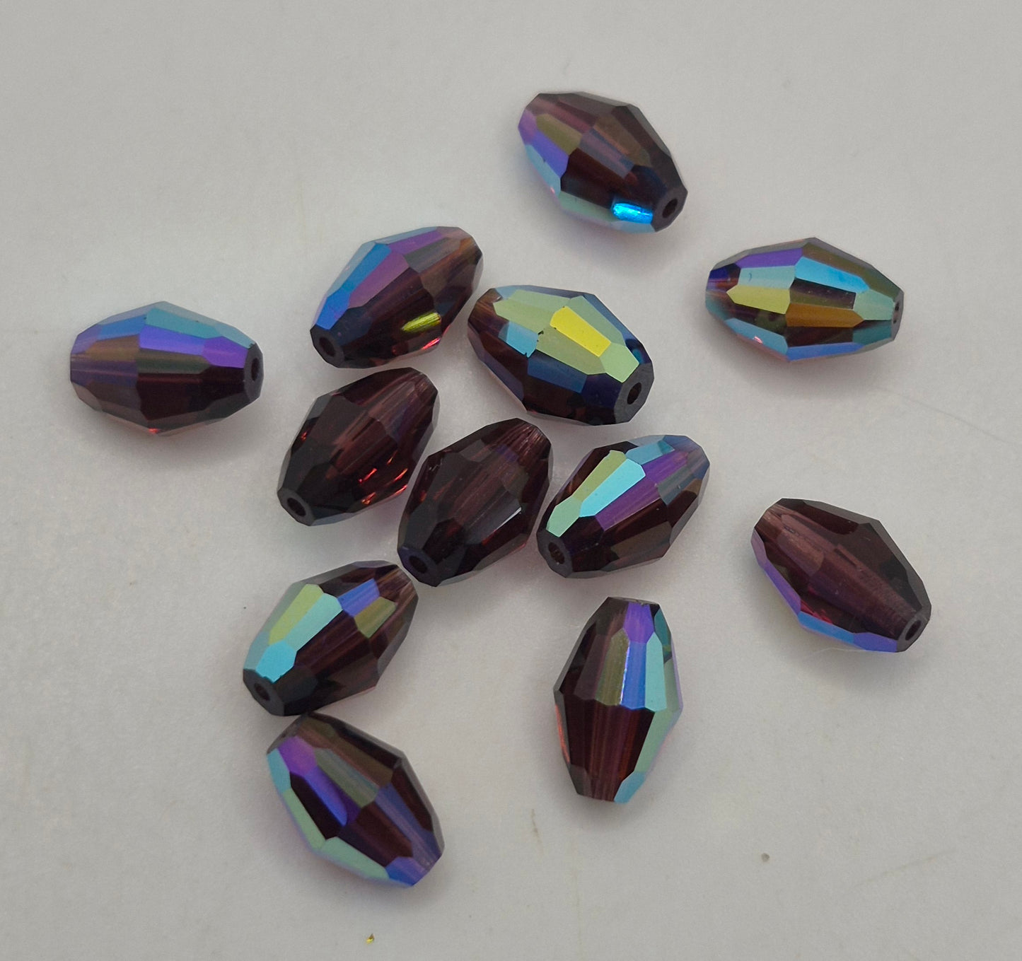 #5200 - Swarovski Crystal 9x6mm Oval Beads; AB Finish; 6pc per pack
