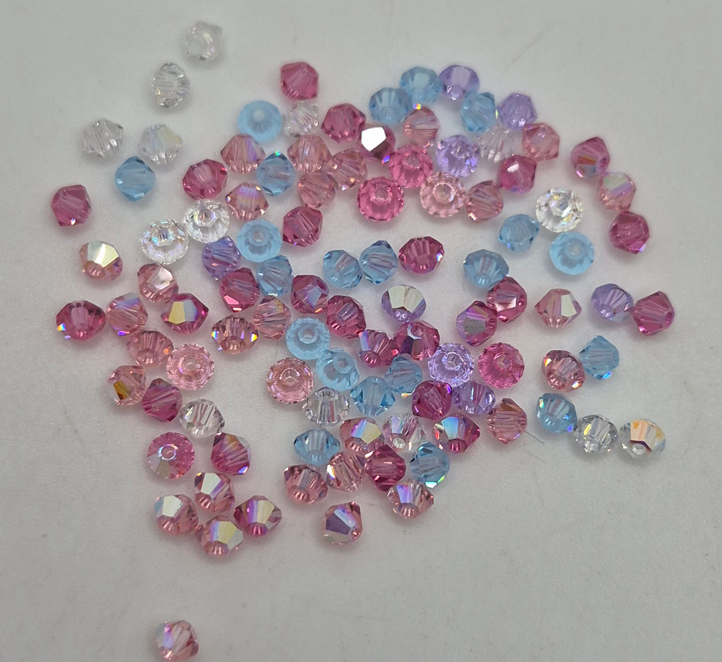 CLEARANCE MIX!  104pc Swarovski Crystal 3mm Bicone Beads; Pinks, Blues, Purples