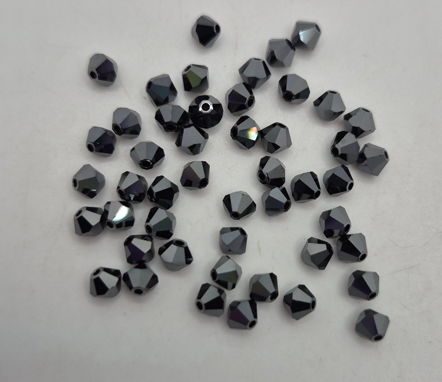 #5328 - Swarovski Crystal 4mm Bicone Beads - Crystal Effects; 24pc per pack