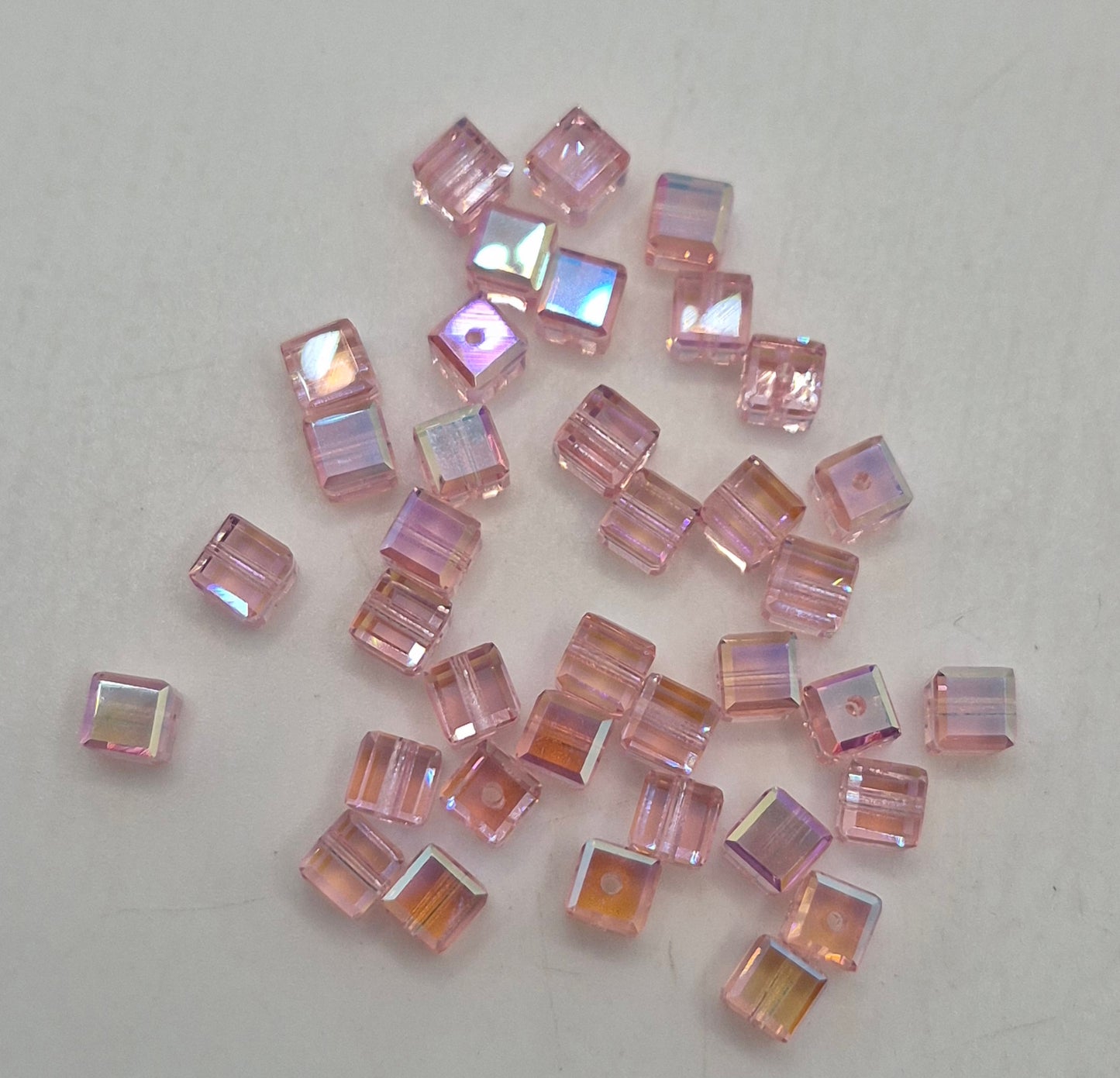 #5601 - Swarovski Crystal 4mm Faceted Cube Beads w/ AB Finish; 12pc per pack