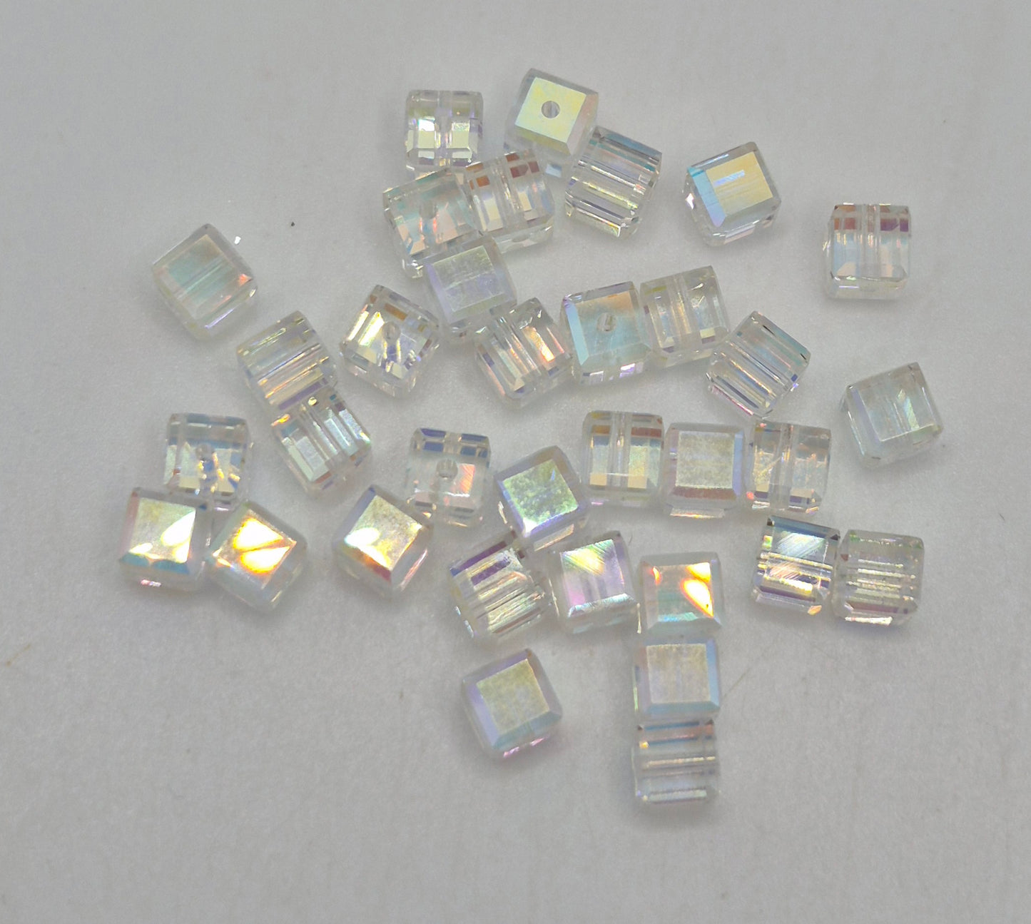 #5601 - Swarovski Crystal 4mm Faceted Cube Beads w/ AB Finish; 12pc per pack