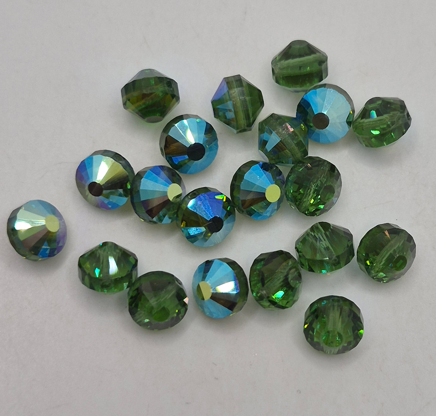 #5101 - Swarovski Crystal Green Turmaline AB 8mm Tablet Beads; 12pc per pack