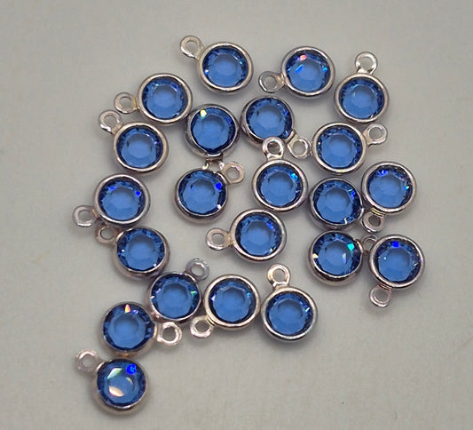 #57700 - Swarovski Crystal Sapphire Silver Plated 4mm 1 Loop Channel Charms; 12pc per pack
