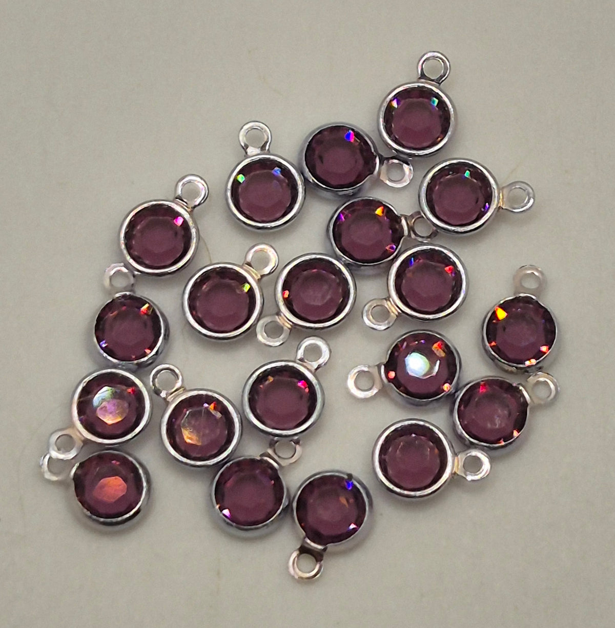 #57700 - Swarovski Crystal Amethyst Silver Plated 4mm 1 Loop Channel Charms; 12pc per pack