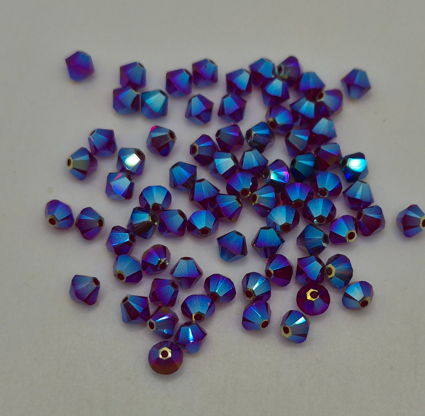 #5328 - Swarovski Crystal 4mm AB2X Bicone Beads; 24pc per pack