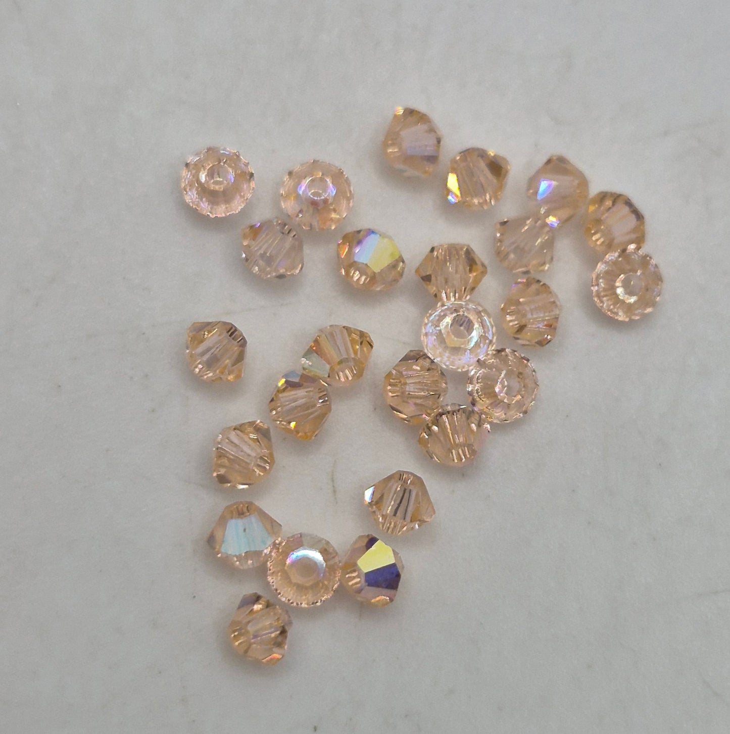 #5328 - 25pc Swarovski Crystal Light Peach AB 3mm Bicone Beads; LAST ONE