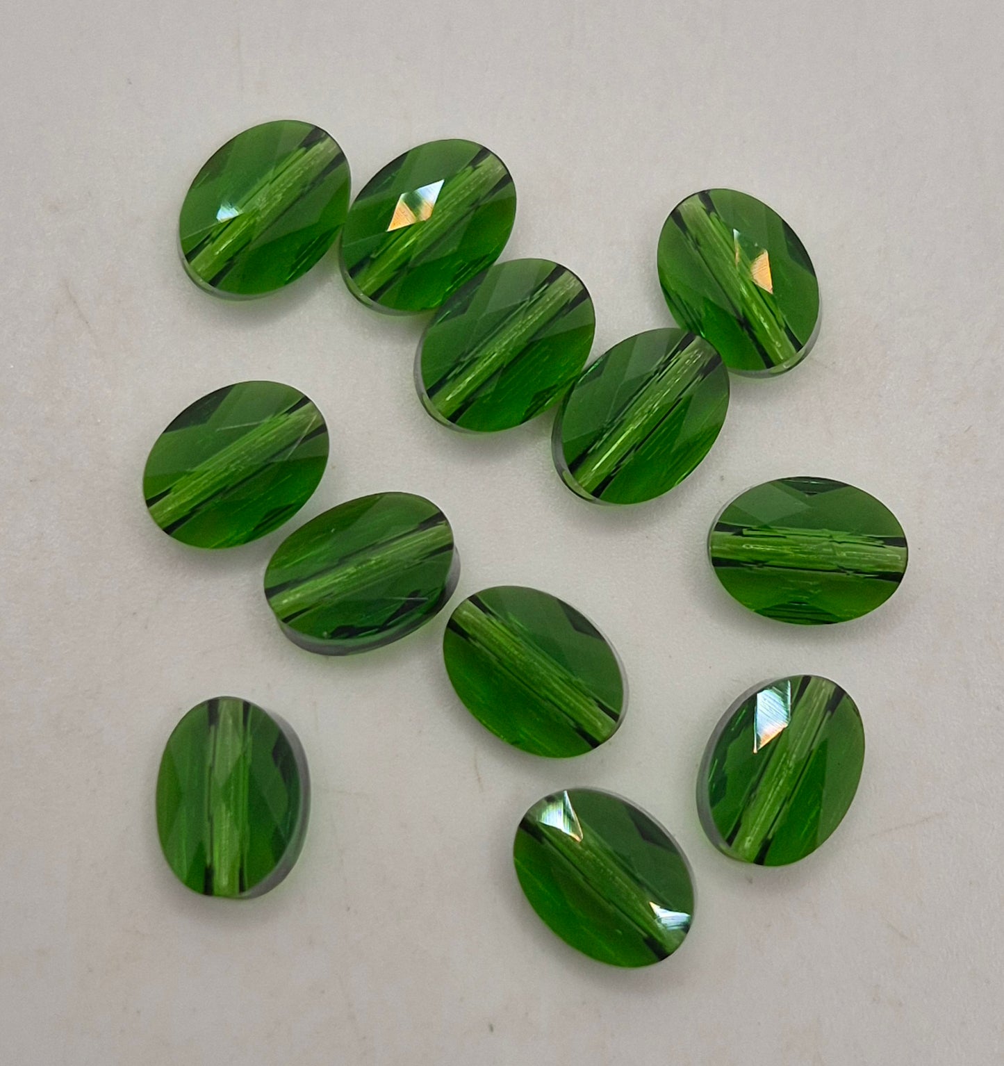 #5051 - 12pc Swarovski Crystal Fern Green 8x6mm Oval Beads; LAST ONE