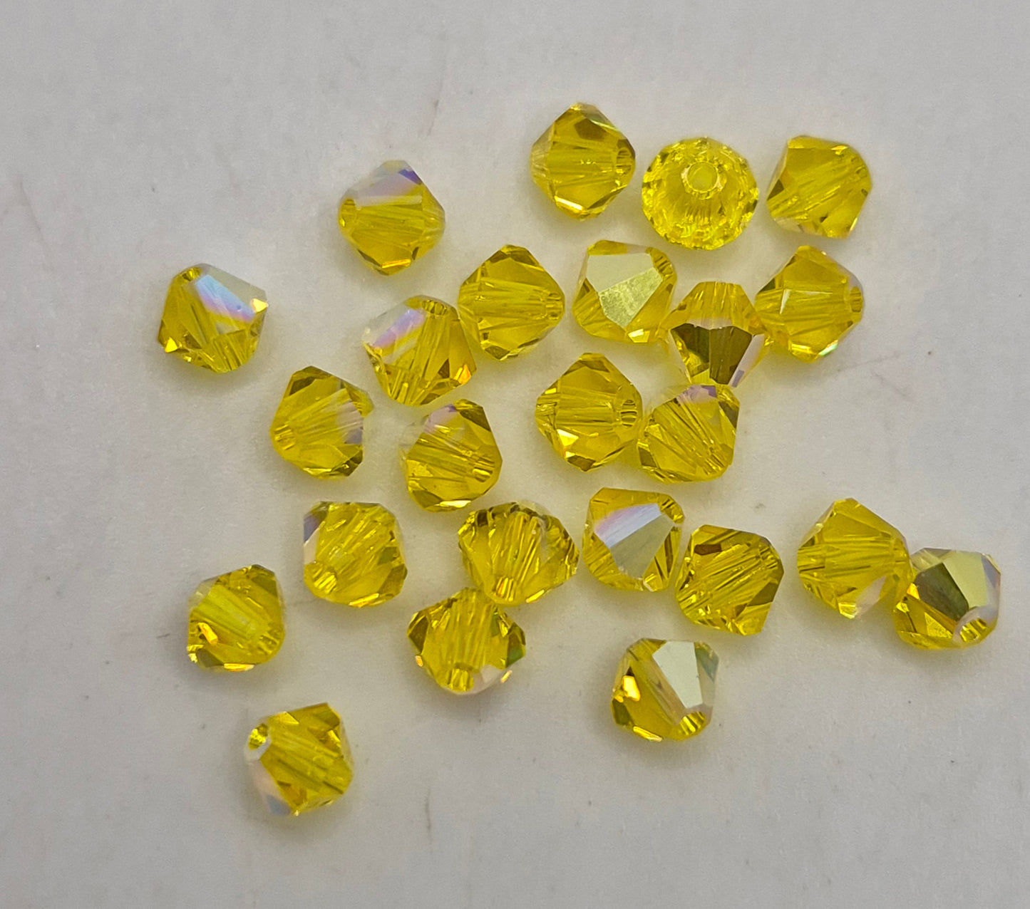 #5328 - Swarovski Crystal 3mm Bicone Beads w/ AB Finish; 24pc per pack