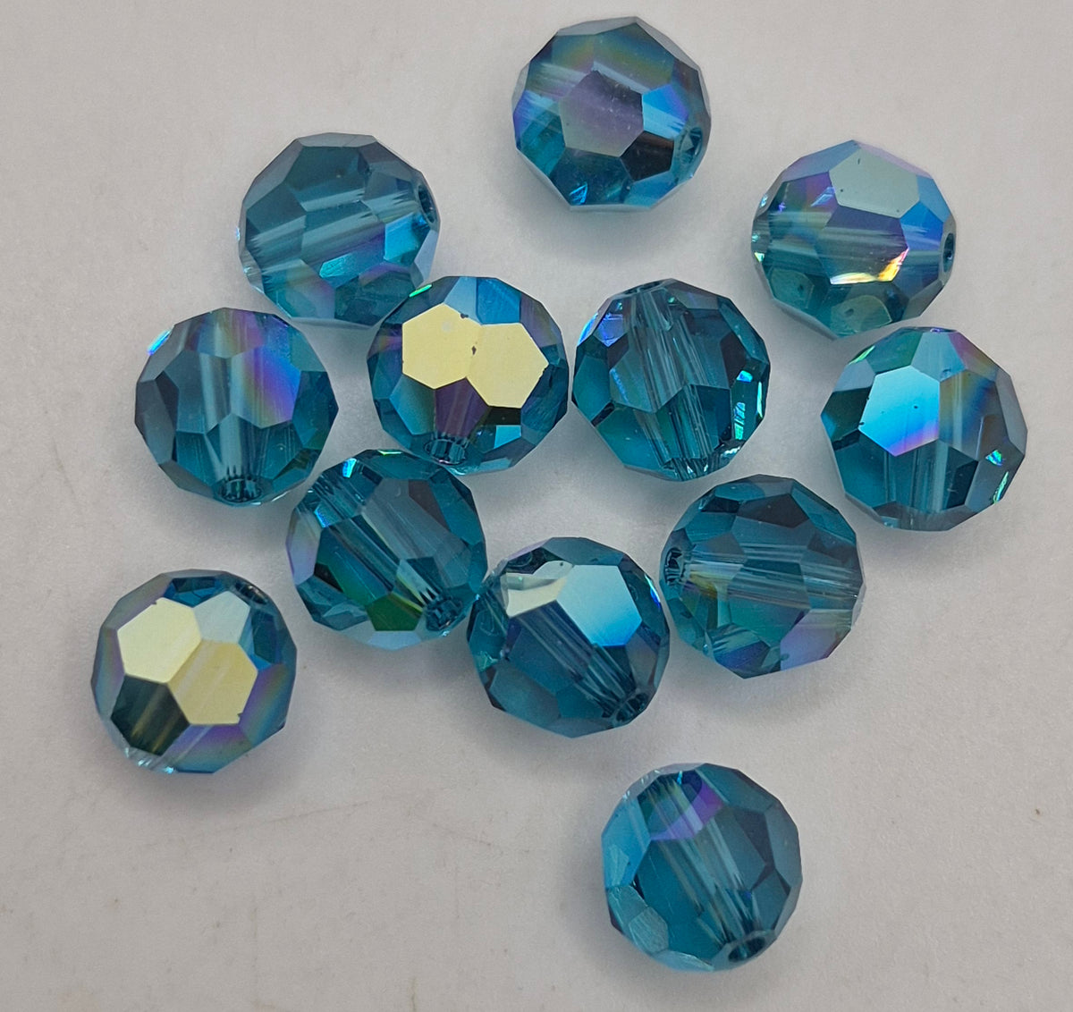 #5000 - 12pc Swarovski Crystal Indicolite AB 8mm Faceted Round Beads; LAST ONE