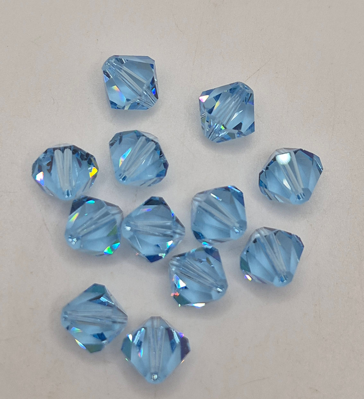 #5328 - 12pc Swarovski Crystal Aquamarine 10mm Bicone Beads; LAST ONE