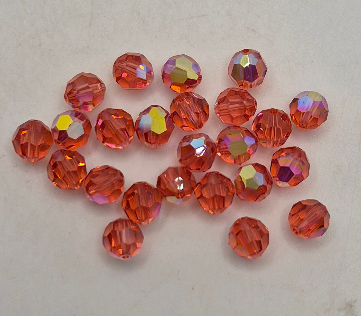 #5000 - Swarovski Crystal 6mm w/ AB Finish Faceted Round Beads; 12pc per pack
