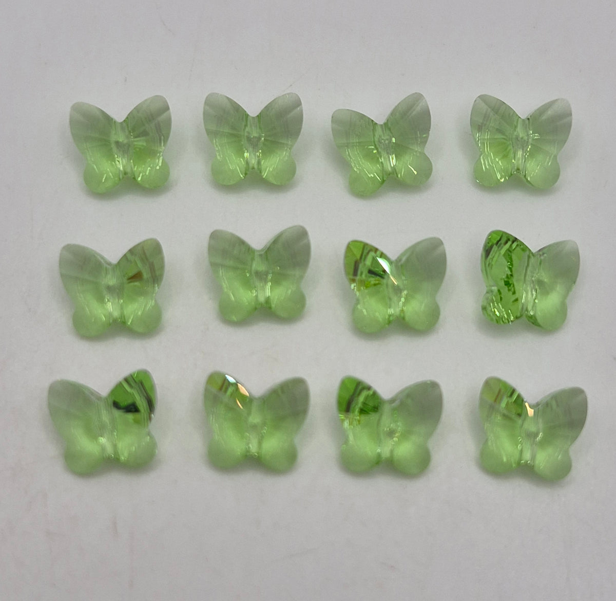 #5754 - 12pc Swarovski Crystal Peridot 10mm Butterfly Beads; LAST ONE