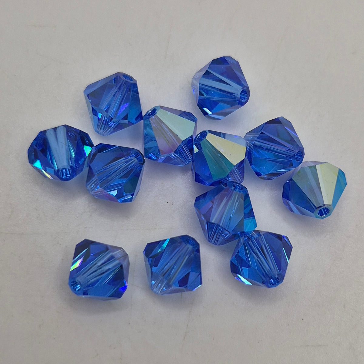 #5328 - 12pc Swarovski Crystal Sapphire AB 8mm Bicone Beads; LAST ONE